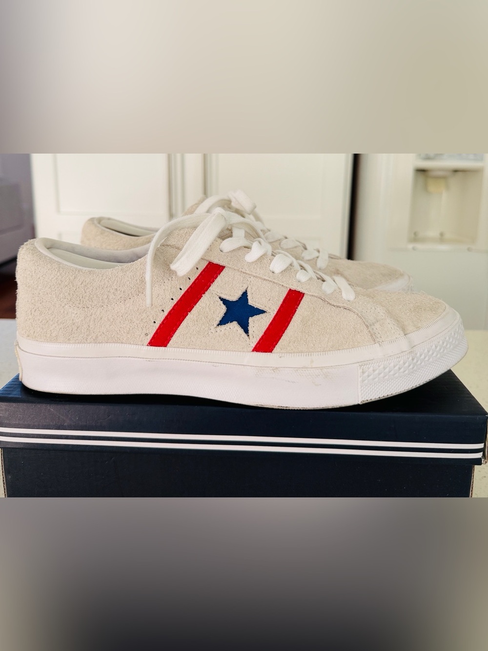 These sneakers are the Converse One Star Academy Ox in the "White /Red/blue